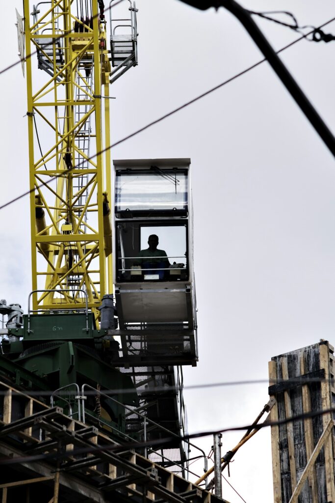 Engineer working at height in a crane cab